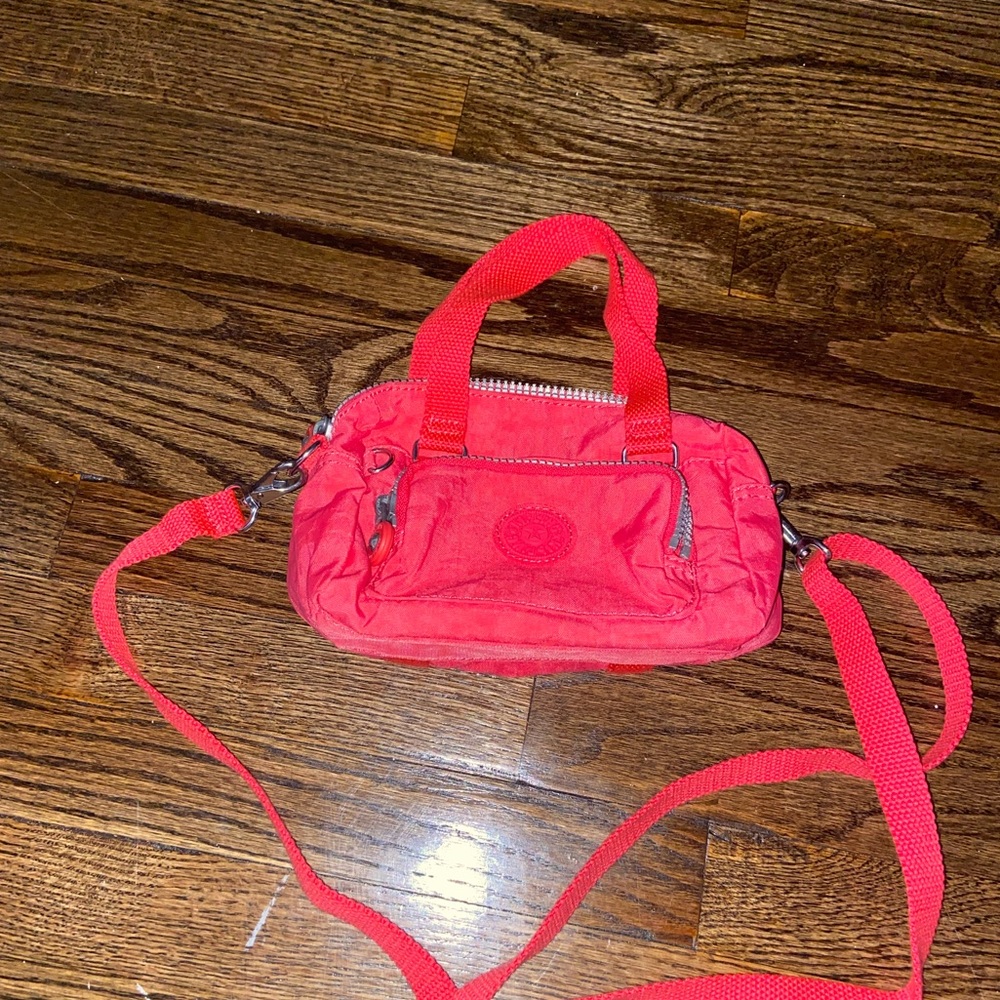 Dark pink Kipling bag
